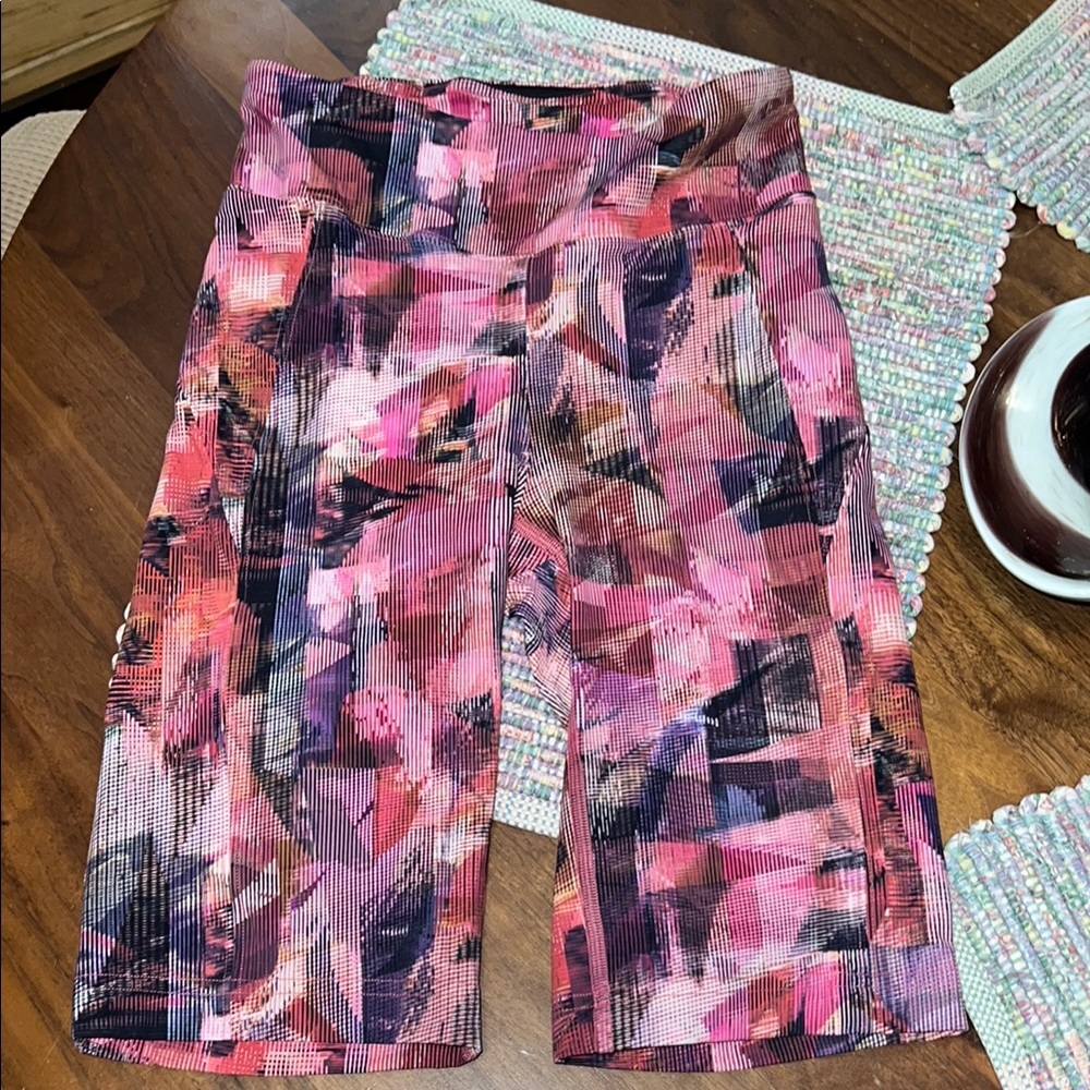 Lululemon Pink and Black Bike Shorts Artistic Design w/side pockets.